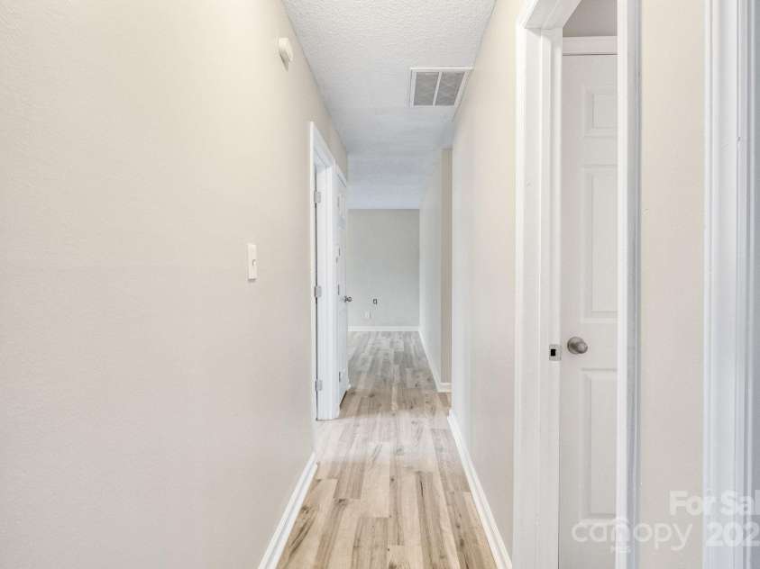 2801 Alleghany Street, Charlotte, NC 28208.  MLS# CAR4239718, YatesRealty ID 7009. Going back down the hallway.
