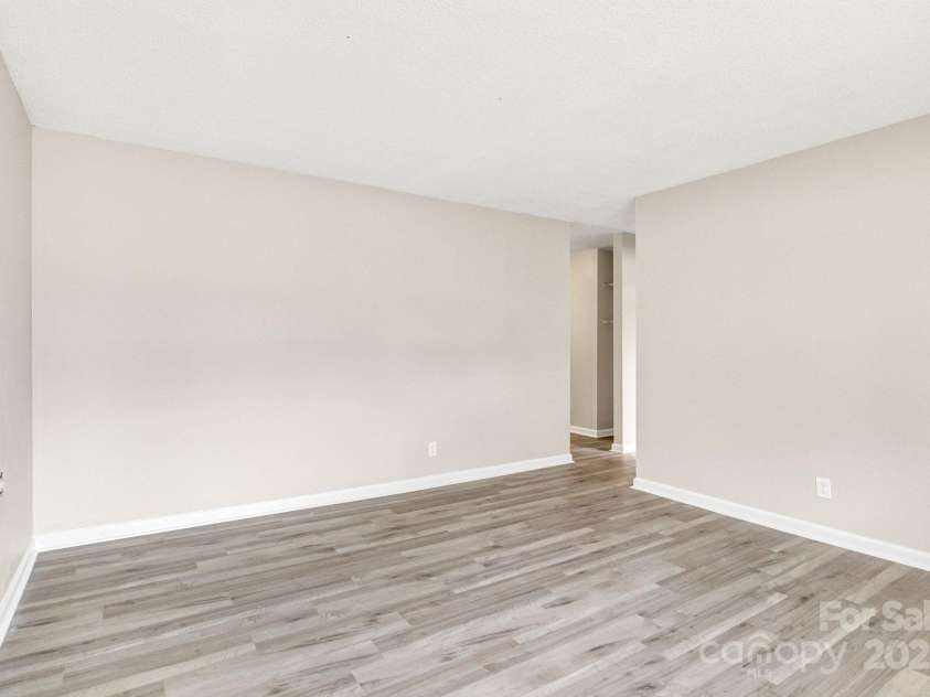 2801 Alleghany Street, Charlotte, NC 28208.  MLS# CAR4239718, YatesRealty ID 7009. Living room immediately walking in.