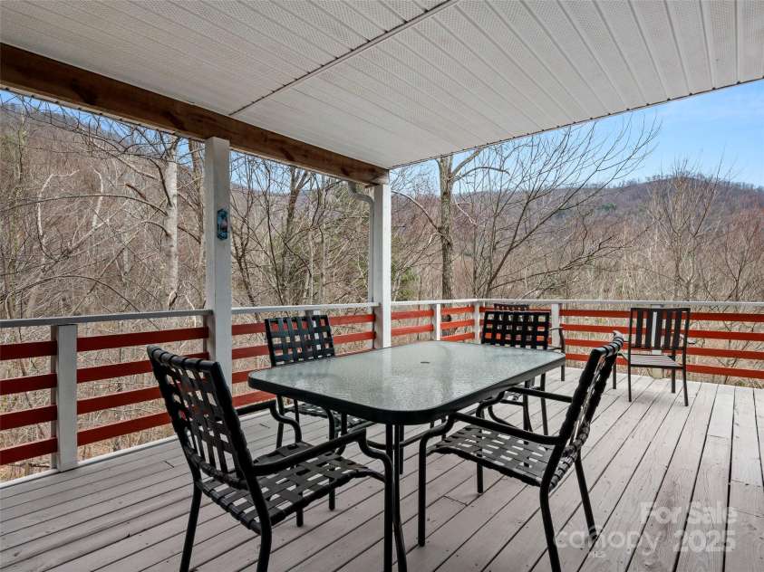 376 Ox Creek Road, Weaverville, NC 28787.  MLS# CAR4241579, YatesRealty ID 7011. Main level deck