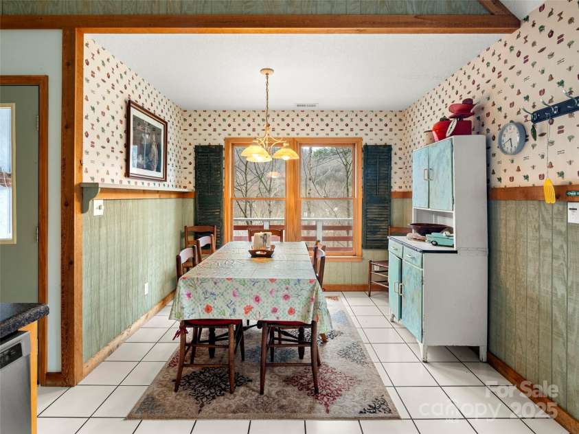 376 Ox Creek Road, Weaverville, NC 28787.  MLS# CAR4241579, YatesRealty ID 7011. Main level dining