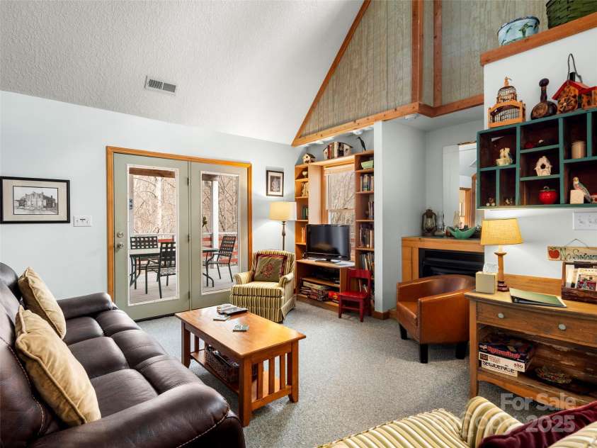 376 Ox Creek Road, Weaverville, NC 28787.  MLS# CAR4241579, YatesRealty ID 7011. Main level living room