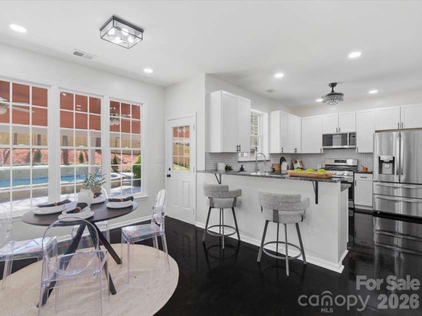 7702 Harrington Woods Road, Charlotte, NC 28269.  MLS# CAR4362387, YatesRealty ID 7016. 