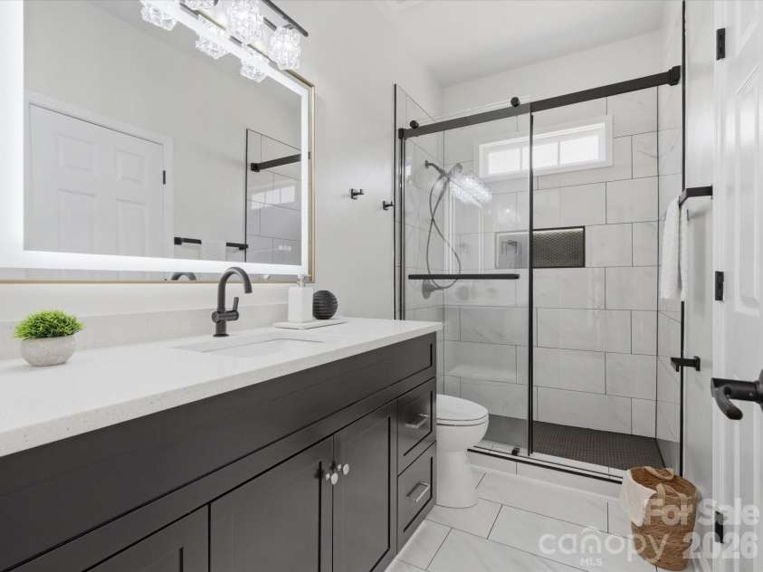 7702 Harrington Woods Road, Charlotte, NC 28269.  MLS# CAR4362387, YatesRealty ID 7016. 