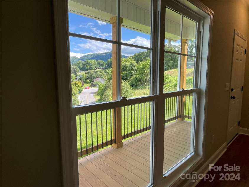373 Barefoot Ridge, Clyde, NC 28721.  MLS# CAR4119628, YatesRealty ID 702. Porch View