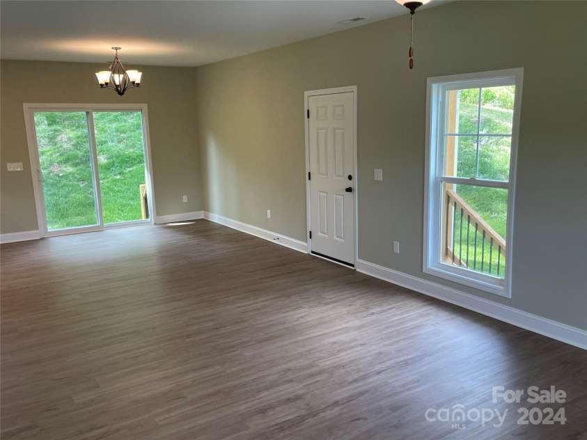 373 Barefoot Ridge, Clyde, NC 28721.  MLS# CAR4119628, YatesRealty ID 702. Side Door