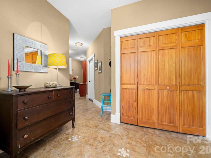 571 Terrys Gap Road, Fletcher, NC 28732.  MLS# CAR4330724, YatesRealty ID 702. Entry to home with coat closet 