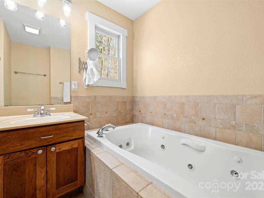571 Terrys Gap Road, Fletcher, NC 28732.  MLS# CAR4330724, YatesRealty ID 702. Jetted tub