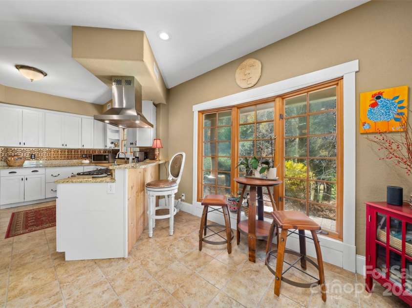 571 Terrys Gap Road, Fletcher, NC 28732.  MLS# CAR4330724, YatesRealty ID 702. Light bright windows