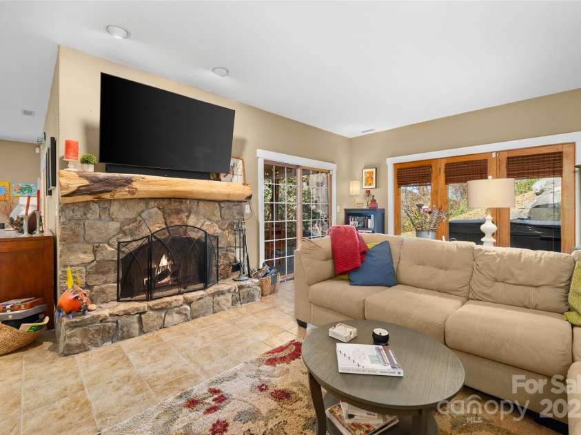 571 Terrys Gap Road, Fletcher, NC 28732.  MLS# CAR4330724, YatesRealty ID 702. Open Living Room wit Fireplace