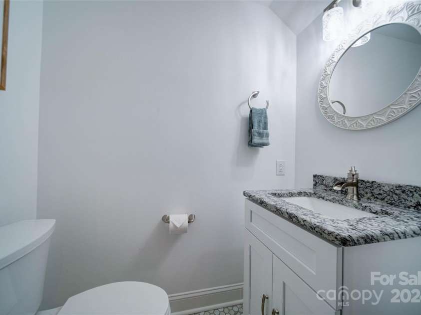 119 Plantation Drive, Mooresville, NC 28117.  MLS# CAR4198986, YatesRealty ID 7020. 1/2 Bath in Garage