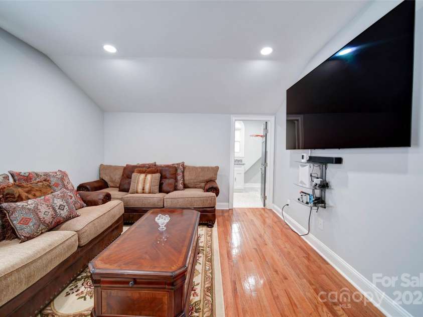 119 Plantation Drive, Mooresville, NC 28117.  MLS# CAR4198986, YatesRealty ID 7020. Another View of Family Room with Access to an Oversize Laundry Room
