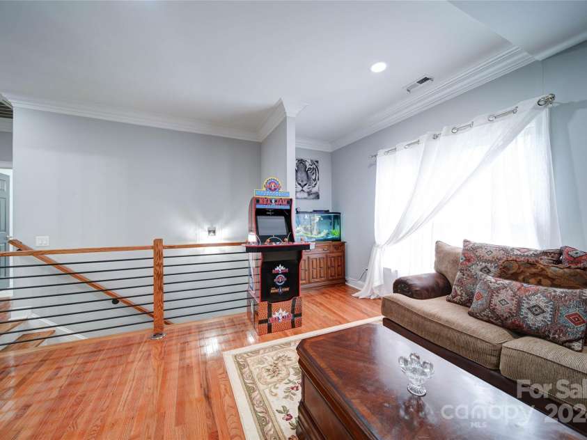 119 Plantation Drive, Mooresville, NC 28117.  MLS# CAR4198986, YatesRealty ID 7020. Come Upstairs to the Family Game Room with Nook for Fish Tank