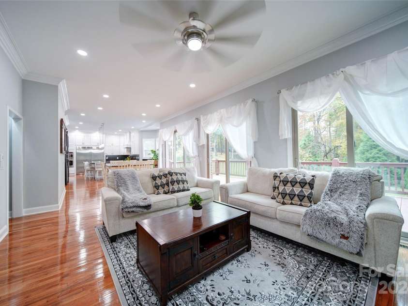 119 Plantation Drive, Mooresville, NC 28117.  MLS# CAR4198986, YatesRealty ID 7020. Family Room Open Concept to Kitchen Notice 3 Sliding Glass Doors with Lots of Natural Lights