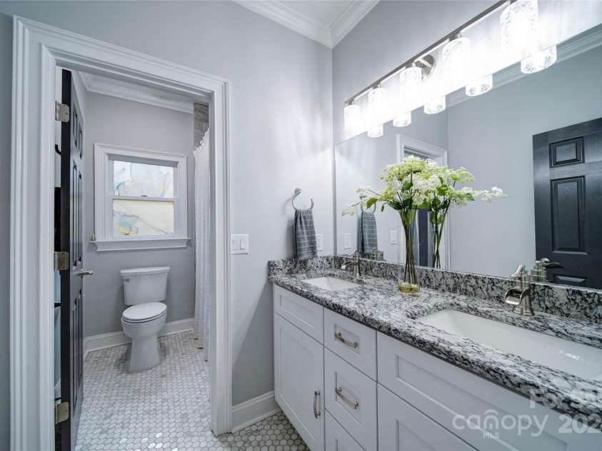 119 Plantation Drive, Mooresville, NC 28117.  MLS# CAR4198986, YatesRealty ID 7020. Guest Full Bath with Dual Vanity and Separate Toilet/Shower Room