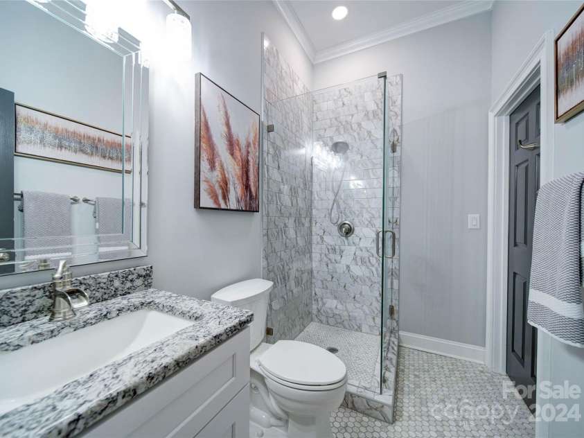 119 Plantation Drive, Mooresville, NC 28117.  MLS# CAR4198986, YatesRealty ID 7020. Main Floor Full Bath.  Notice the Beautiful Tiles