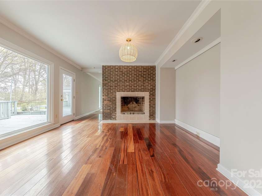 10101 Woodview Circle, Charlotte, NC 28277.  MLS# CAR4233546, YatesRealty ID 7021. Dining Room Fireplace