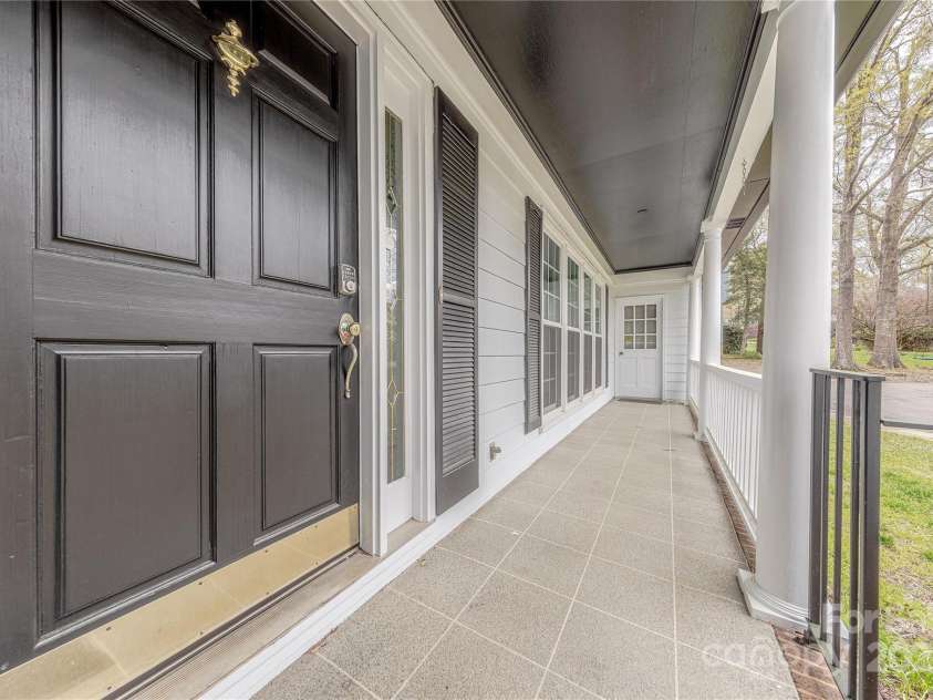 10101 Woodview Circle, Charlotte, NC 28277.  MLS# CAR4233546, YatesRealty ID 7021. Rocking Chair Front Porch