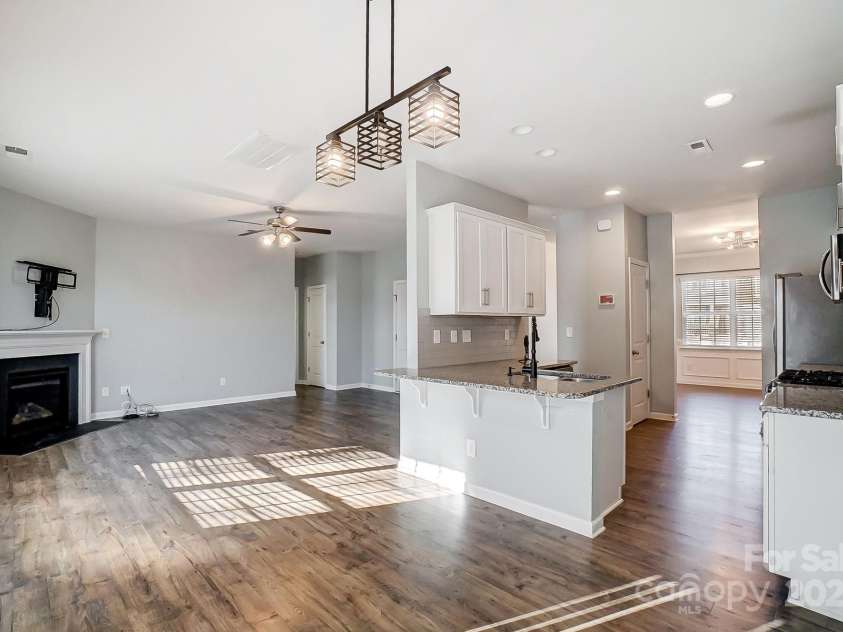 2224 Apple Glen Lane, Charlotte, NC 28269.  MLS# CAR4213000, YatesRealty ID 7022. Breakfast & Living Room