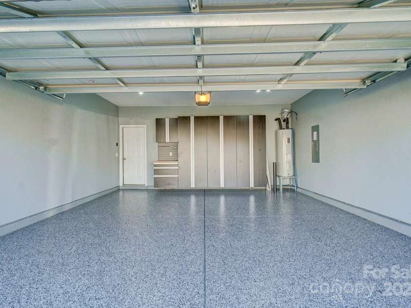 2224 Apple Glen Lane, Charlotte, NC 28269.  MLS# CAR4213000, YatesRealty ID 7022. Finished Garage