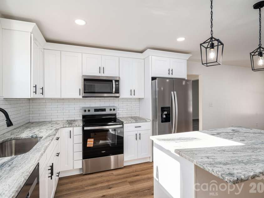 1928 Noles Circle, Lincolnton, NC 28092.  MLS# CAR4359715, YatesRealty ID 7023. Kitchen- all timeless stainless appliances
