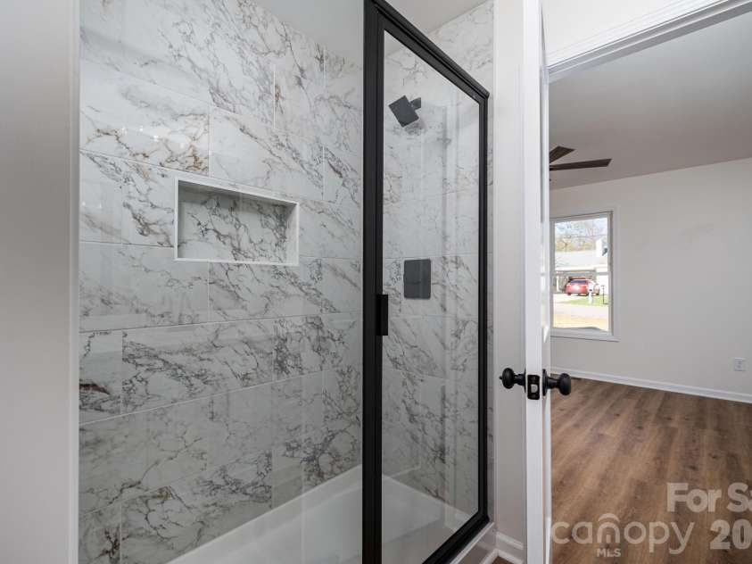 1928 Noles Circle, Lincolnton, NC 28092.  MLS# CAR4359715, YatesRealty ID 7023. Primary tiled shower