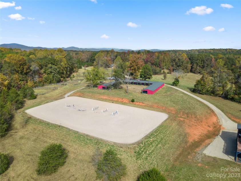 1642 Smith Waldrop Road, Mill Spring, NC 28756.  MLS# CAR4089037, YatesRealty ID 7026. Arena & Barn