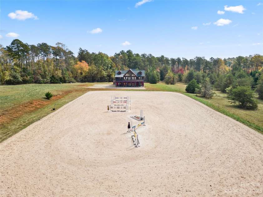 1642 Smith Waldrop Road, Mill Spring, NC 28756.  MLS# CAR4089037, YatesRealty ID 7026. EIS Irrigated Competition Arena