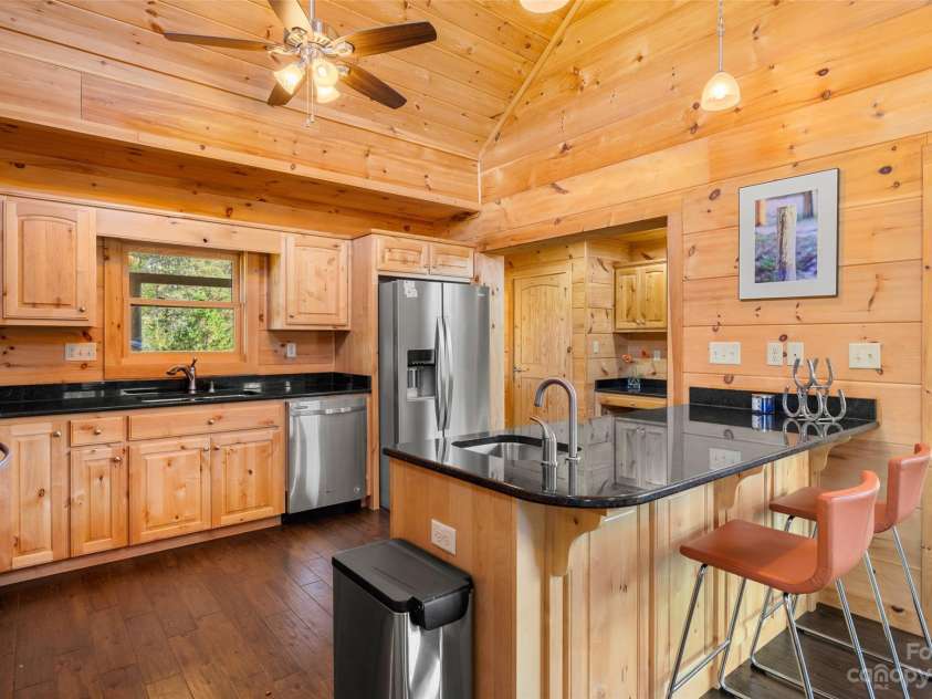 1642 Smith Waldrop Road, Mill Spring, NC 28756.  MLS# CAR4089037, YatesRealty ID 7026. Kitchen Breakfast Bar