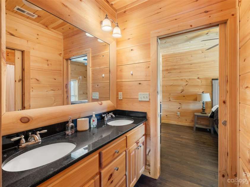 1642 Smith Waldrop Road, Mill Spring, NC 28756.  MLS# CAR4089037, YatesRealty ID 7026. Lower Level 2nd Jack Jill Bath