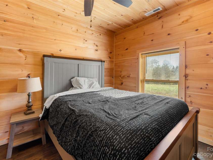 1642 Smith Waldrop Road, Mill Spring, NC 28756.  MLS# CAR4089037, YatesRealty ID 7026. Lower Level Bedroom - Jack Jill