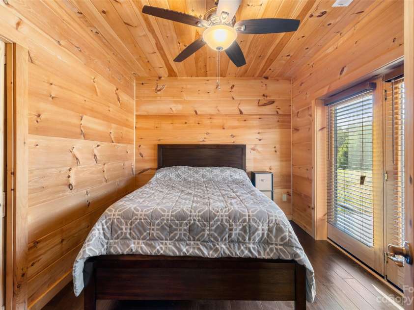 1642 Smith Waldrop Road, Mill Spring, NC 28756.  MLS# CAR4089037, YatesRealty ID 7026. Lower Level Bedroom - Jack Jill