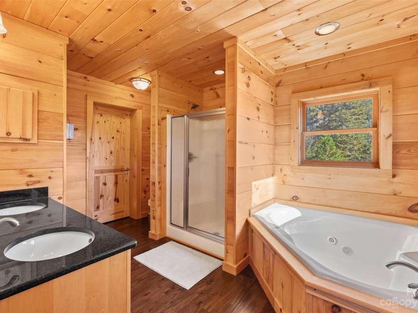 1642 Smith Waldrop Road, Mill Spring, NC 28756.  MLS# CAR4089037, YatesRealty ID 7026. Primary Bath & Walk In Closet