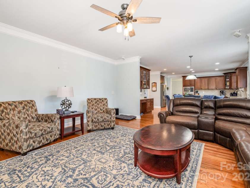 16636 Flintrock Falls Lane, Charlotte, NC 28278.  MLS# CAR4245046, YatesRealty ID 7026. Living room off the kitchen