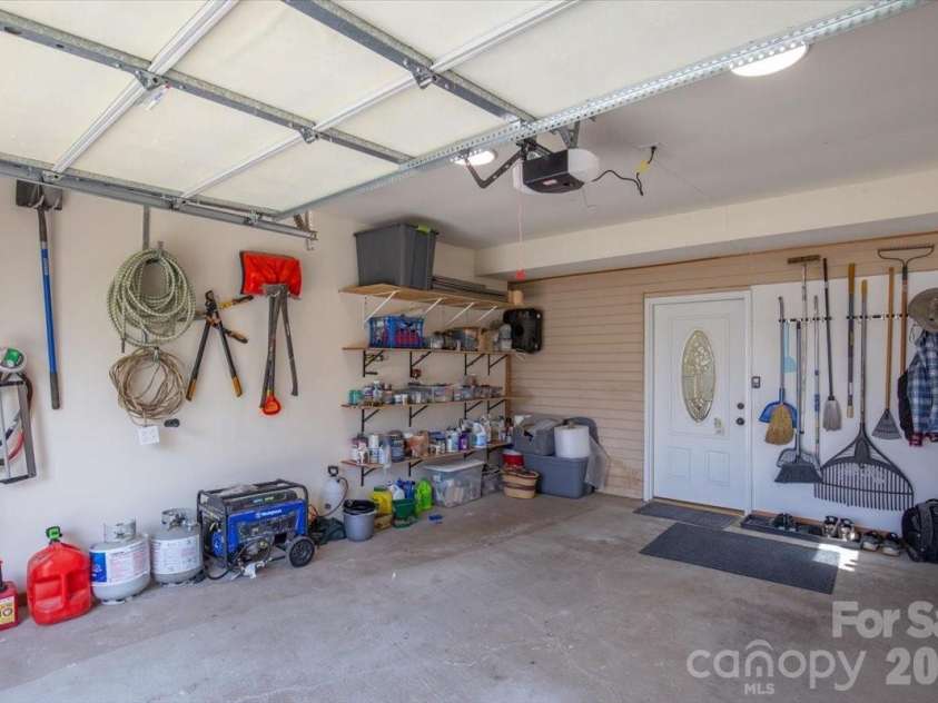 22 Stoney Nob Drive, Hendersonville, NC 28792.  MLS# CAR4354591, YatesRealty ID 7029. Garage view 1