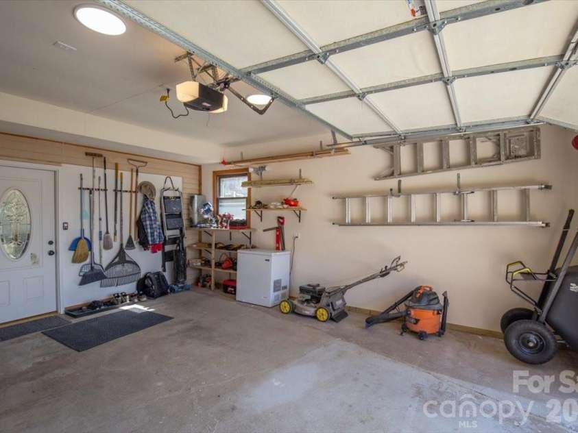 22 Stoney Nob Drive, Hendersonville, NC 28792.  MLS# CAR4354591, YatesRealty ID 7029. Garage view 3 -room for your tools
