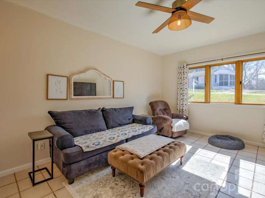 22 Stoney Nob Drive, Hendersonville, NC 28792.  MLS# CAR4354591, YatesRealty ID 7029. Natural light from large windows