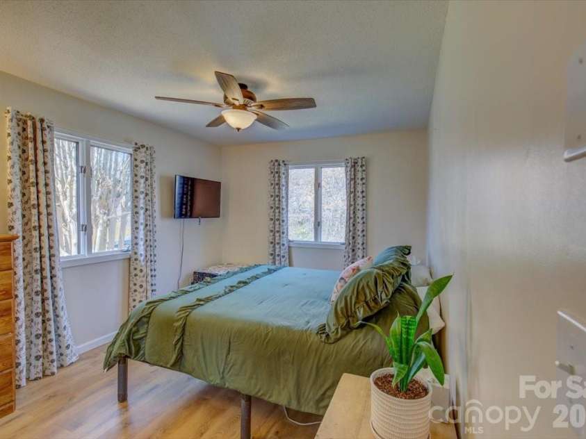 22 Stoney Nob Drive, Hendersonville, NC 28792.  MLS# CAR4354591, YatesRealty ID 7029. Primary bedroom view 1
