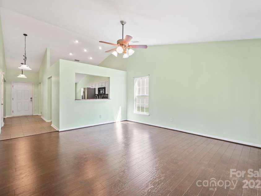 1838 Summit Ridge Lane, Kannapolis, NC 28083.  MLS# CAR4240108, YatesRealty ID 7030. Great room looking into kitchen and hallway