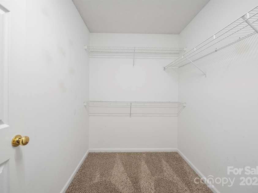 1838 Summit Ridge Lane, Kannapolis, NC 28083.  MLS# CAR4240108, YatesRealty ID 7030. Primary bedroom walk in closet