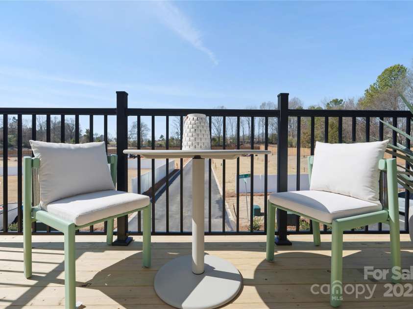 5723 Castlerea Drive, Charlotte, NC 28217.  MLS# CAR4232708, YatesRealty ID 7031. Braden Model Balcony | Southmont *actual finishes, color scheme, orientation vary on this home. Furniture not included