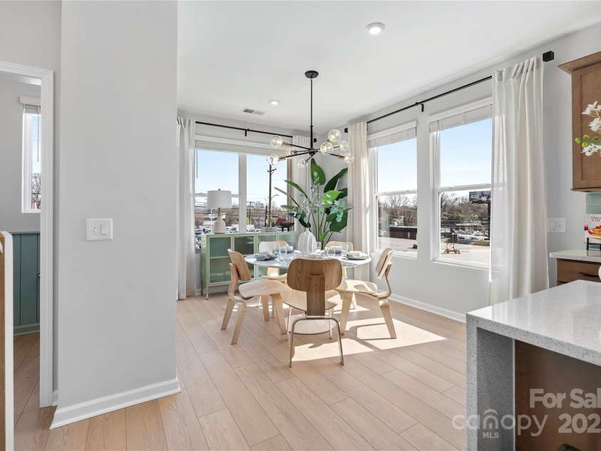 5723 Castlerea Drive, Charlotte, NC 28217.  MLS# CAR4232708, YatesRealty ID 7031. Braden Model Dining Area | Southmont *actual finishes, color scheme, orientation vary on this home. Furniture not included