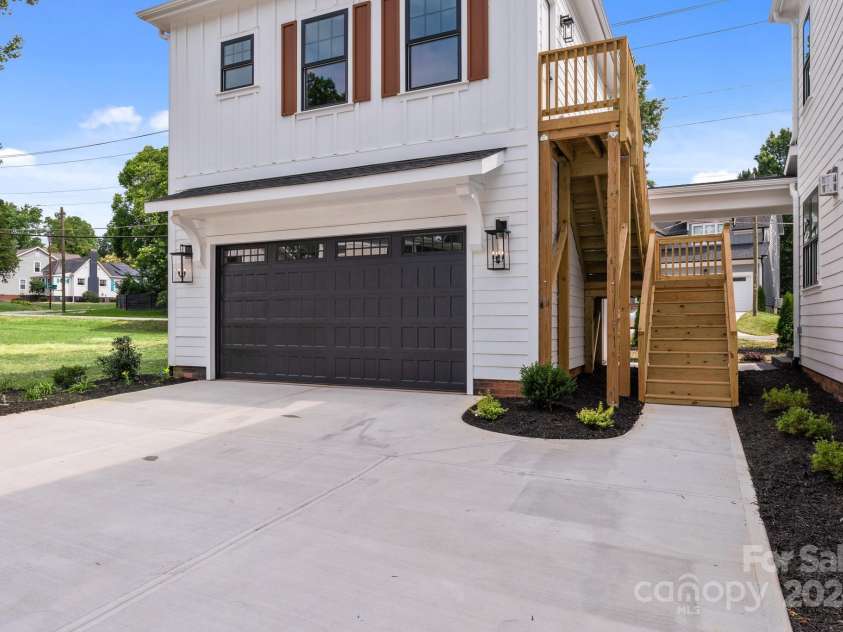 1529 Beckwith Place, Charlotte, NC 28205.  MLS# CAR4155227, YatesRealty ID 7036. Garage and extra living space above garage