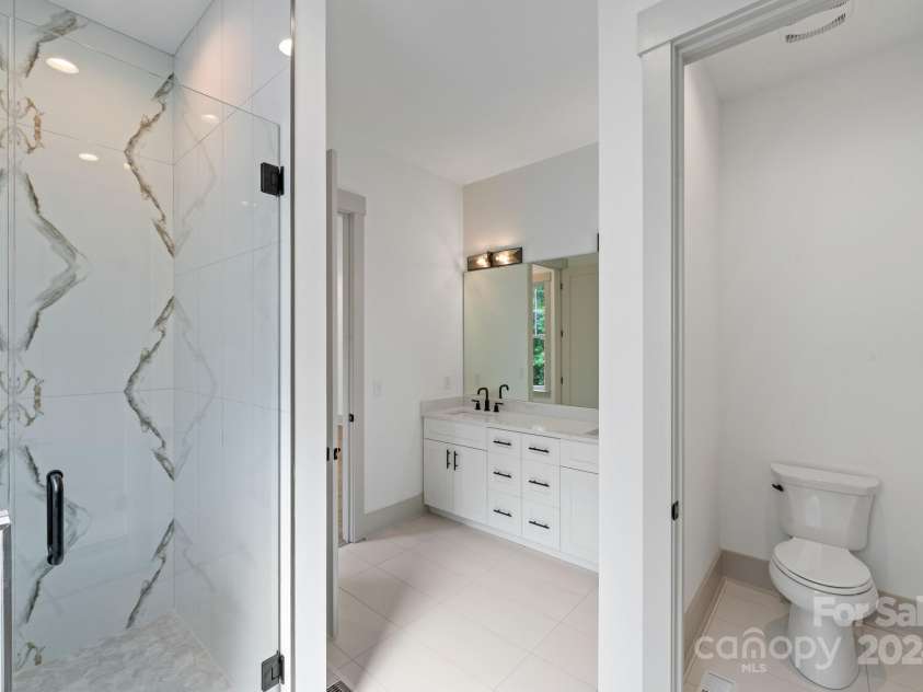 1529 Beckwith Place, Charlotte, NC 28205.  MLS# CAR4155227, YatesRealty ID 7036. Primary Bathroom downstairs