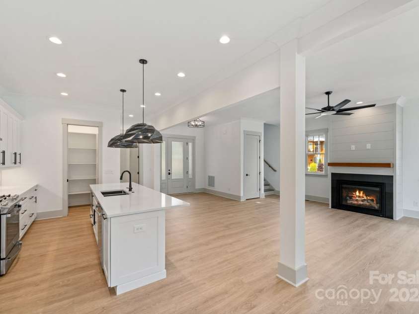 1529 Beckwith Place, Charlotte, NC 28205.  MLS# CAR4155227, YatesRealty ID 7036. View from Dining room into kitchen and Living Room