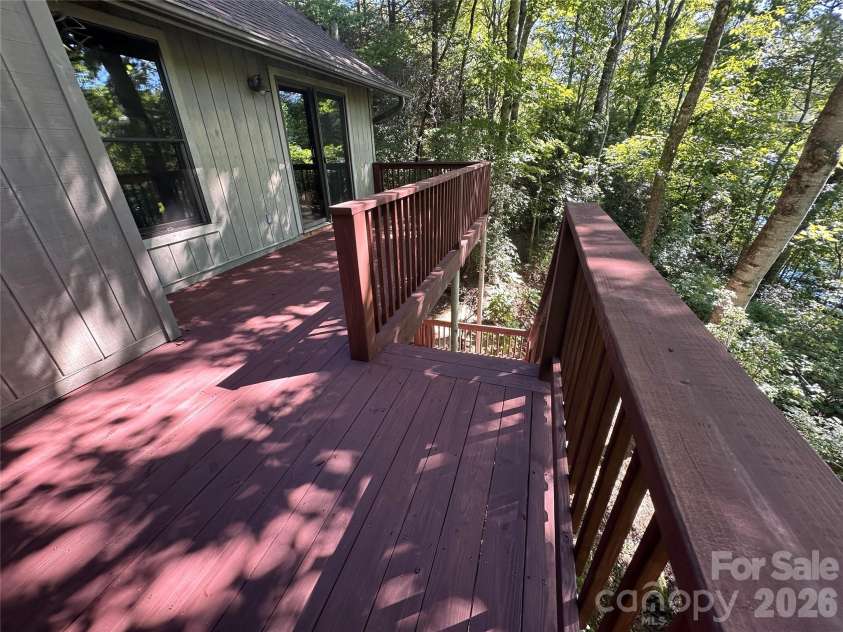 306 Sequoyah Lane, Brevard, NC 28712.  MLS# CAR4355647, YatesRealty ID 7036. Freshly replaced deck