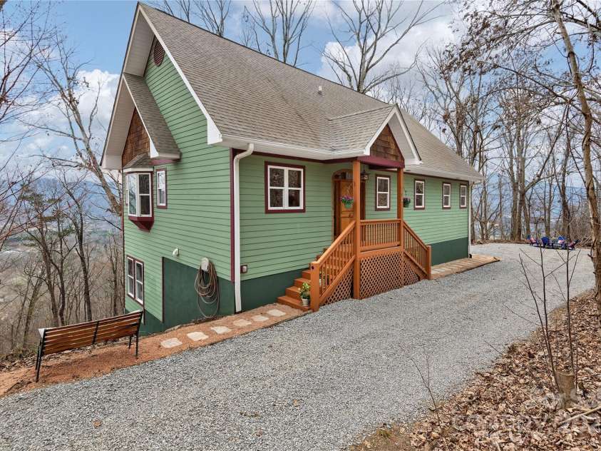 72 Wildflower Mountain Trail, Candler, NC 28715.  MLS# CAR4216852, YatesRealty ID 7043. Custom Built Beauty with Long Range Views