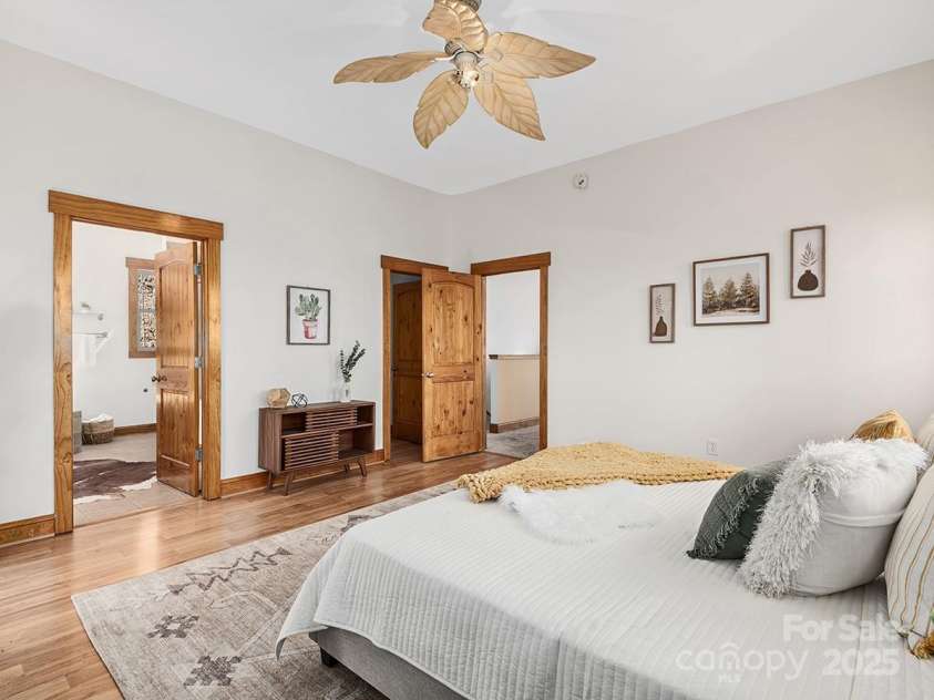 72 Wildflower Mountain Trail, Candler, NC 28715.  MLS# CAR4216852, YatesRealty ID 7043. En-suite bathroom off primary, beautiful wood finishes throughout