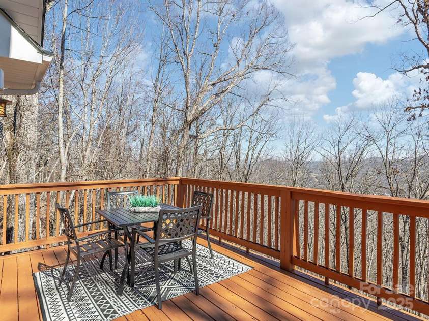 72 Wildflower Mountain Trail, Candler, NC 28715.  MLS# CAR4216852, YatesRealty ID 7043. Perfect space for dining, gathering, and hosting outdoors