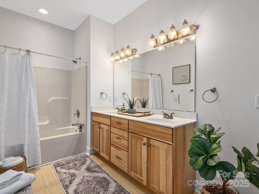 72 Wildflower Mountain Trail, Candler, NC 28715.  MLS# CAR4216852, YatesRealty ID 7043. Spacious full bathroom on lower level