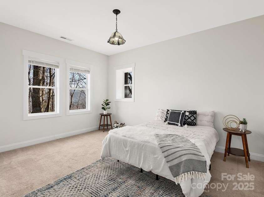 72 Wildflower Mountain Trail, Candler, NC 28715.  MLS# CAR4313051, YatesRealty ID 7043. Guest Bedroom On Lower Level Filled With Natural Light